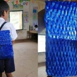 Tak Punya Cukup Uang, Bocah Ini Pakai Tas Sekolah Dari Tali Rafia Buatan Ayahnya