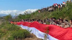 Polres Bima dan Brimob Kibarkan Bendera Merah Putih Raksasa di Puncak Dorobelo, Rayakan HUT RI ke-80 dengan Semangat Perjuangan