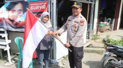 Polres Pasaman Barat Bagikan Ribuan Bendera Merah Putih Jelang HUT RI ke-81